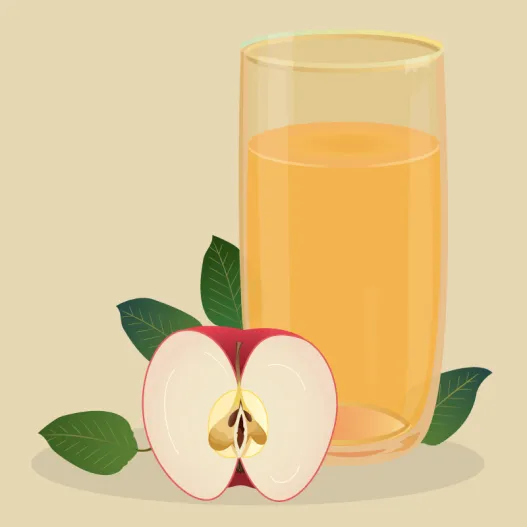 Un verre de jus de pomme.